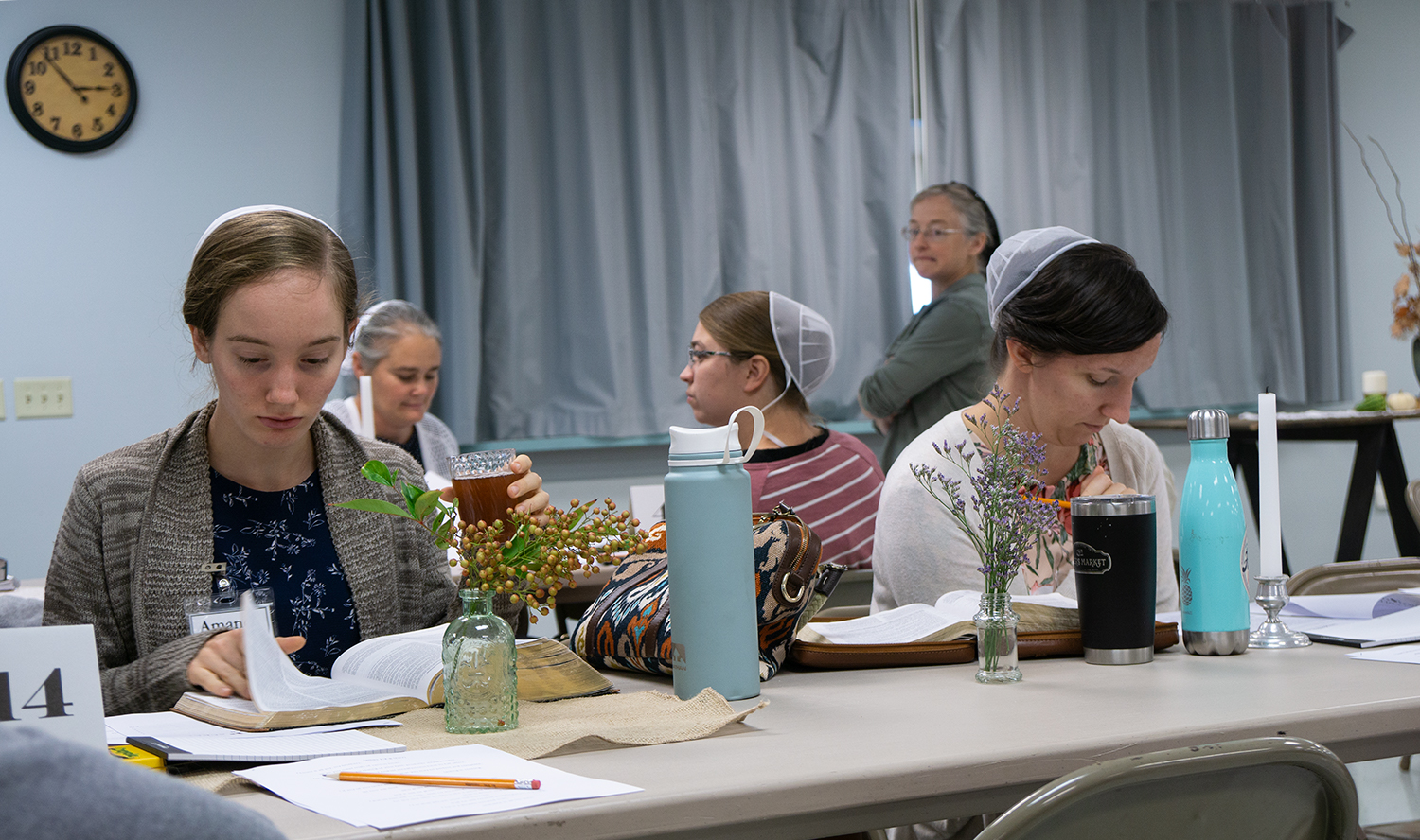 Mennonite women studying at a Bible Conference