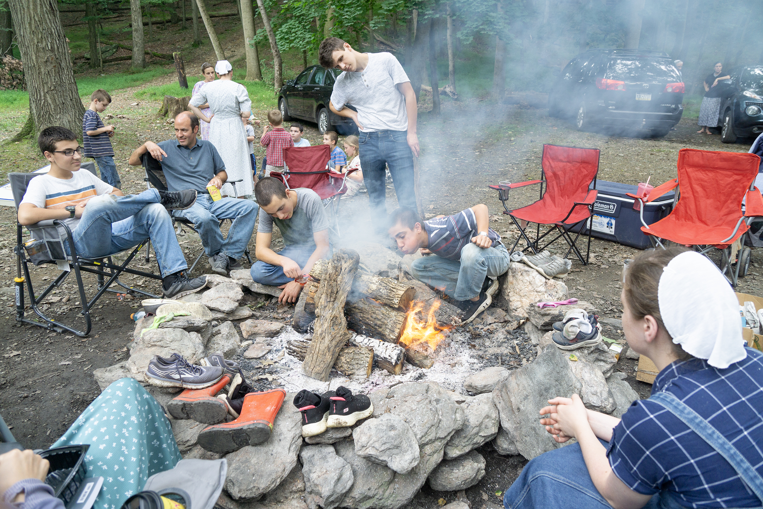 Family camping in woods