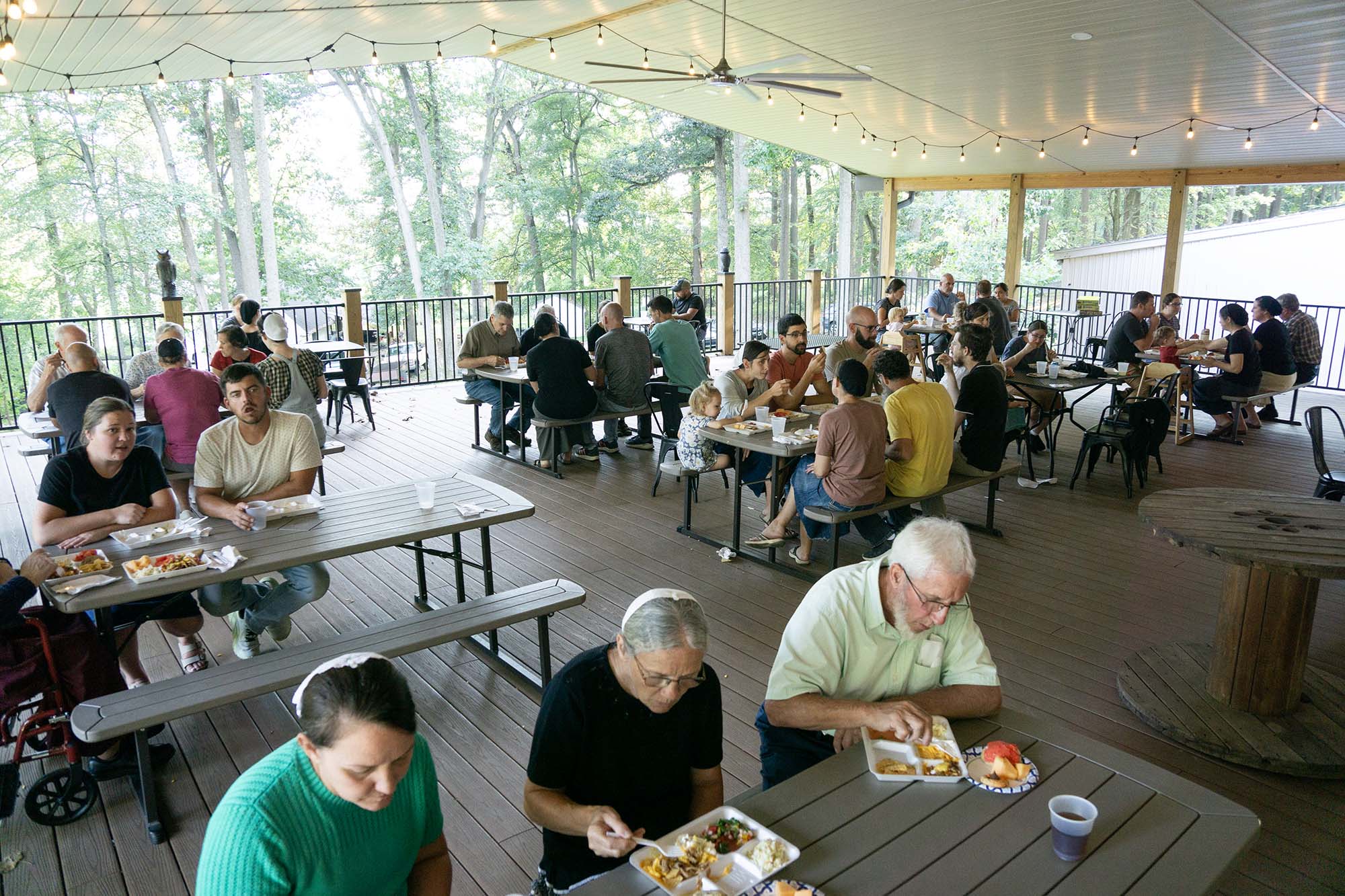 Mennonites enjoying a meal together.